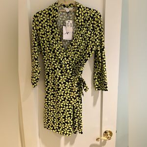 DVF wrap jumper / romper size 12new with tags